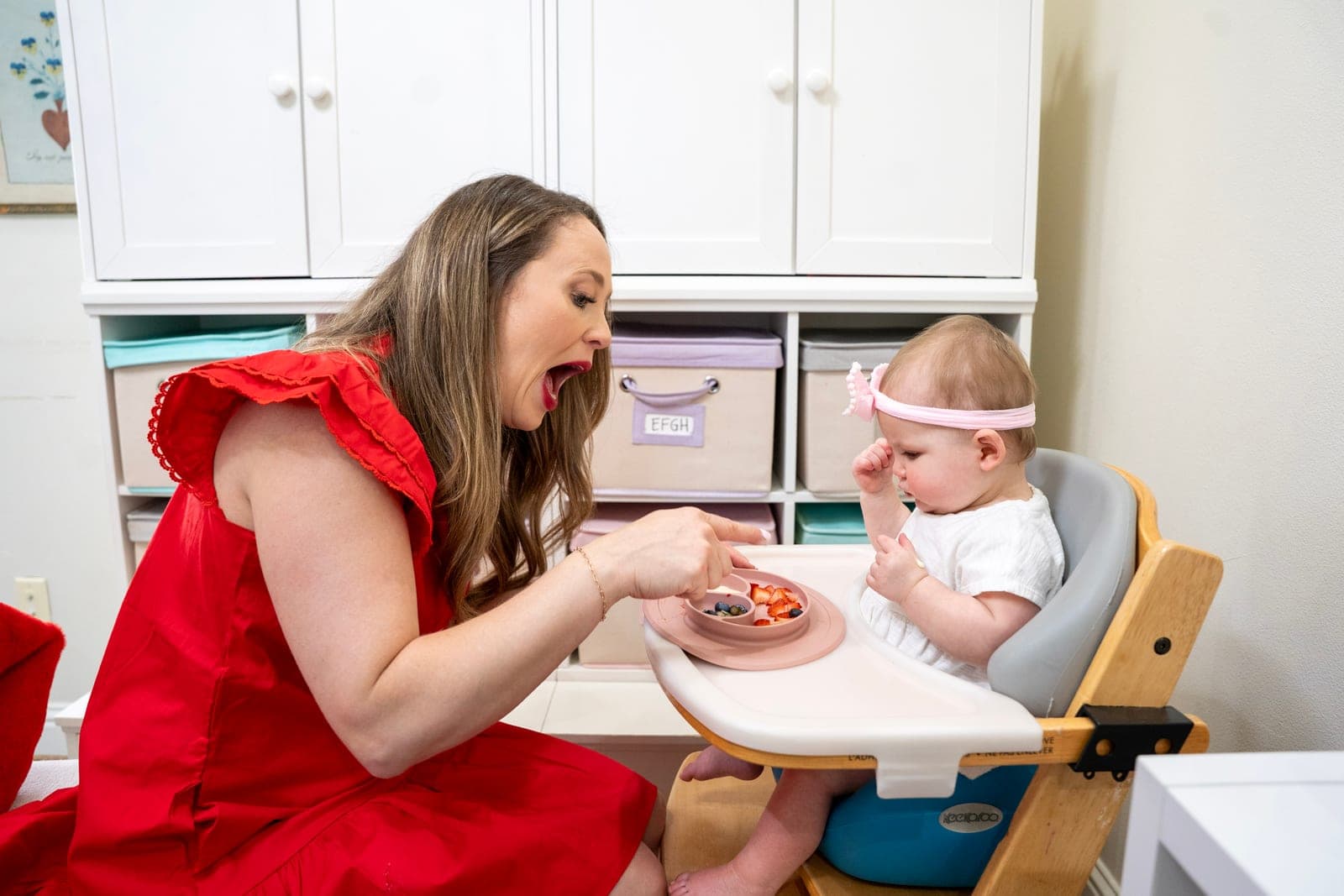 Laura supporting an infant in feeding therapy
